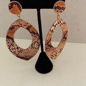 Snake Print Dangle Earrings posts.